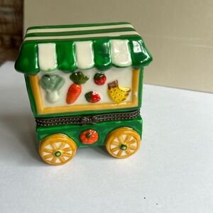 Vintage vegetable hinged trinket cart.
